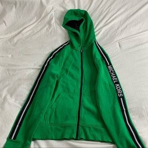 Green Medium MK Jacket. It runs big and will keep you warm! Interesting color!